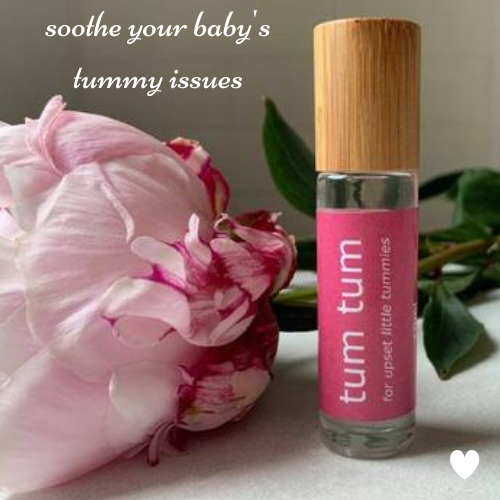 10ml bamboo and glass essential oil roller bottle for babies' tummy issues.