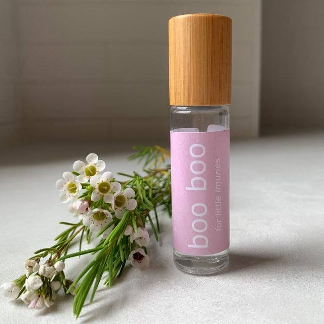 10ml bamboo and glass essential oil roller bottle for children's injuries.