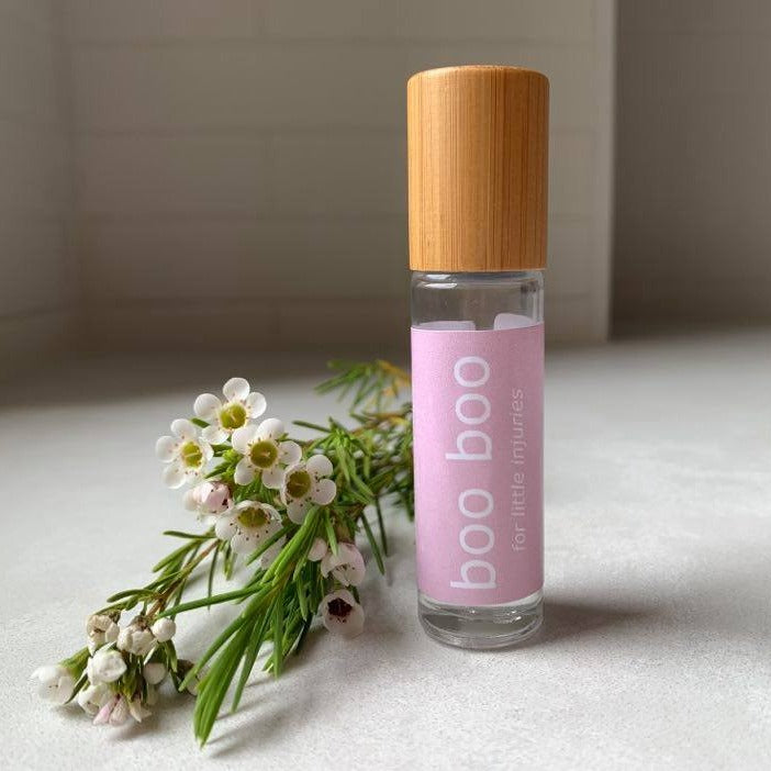boo boo essential oil roller blend containing Helichrysum, Lavender and Tea Tree oil.
