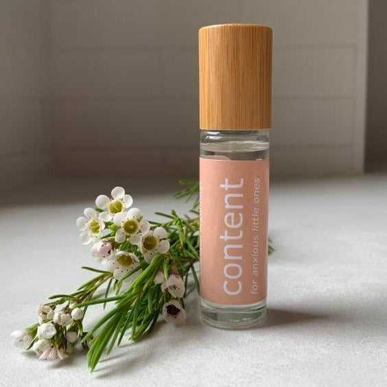 content essential oil roller blend with lavender,  Douglas Fir and Litsea.