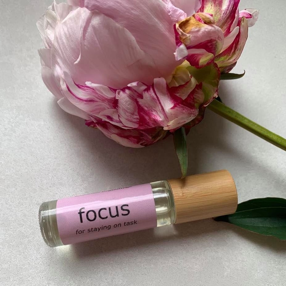 10ml bamboo and glass essential oil roller bottle for concentration.