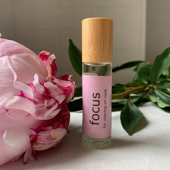 focus essential oil roller blend with basil wild Orange, and Douglas Fir.