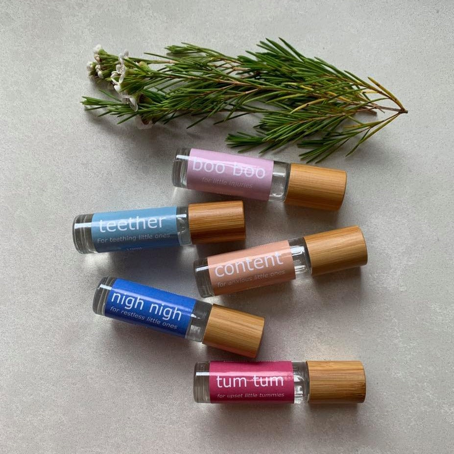 boo boo essential oil roller blend containing Helichrysum, Lavender and Tea Tree oil. content essential oil roller blend with lavender,  Douglas Fir and Litsea. nigh nigh essential oil roller blend with Lavender, Roman Chamomile and Vetiver. teether essential oil roller blend with Copaiba, Lavender and Roman Chamomile. tum tum essential oil roller blend with Digestzen and Lavender.