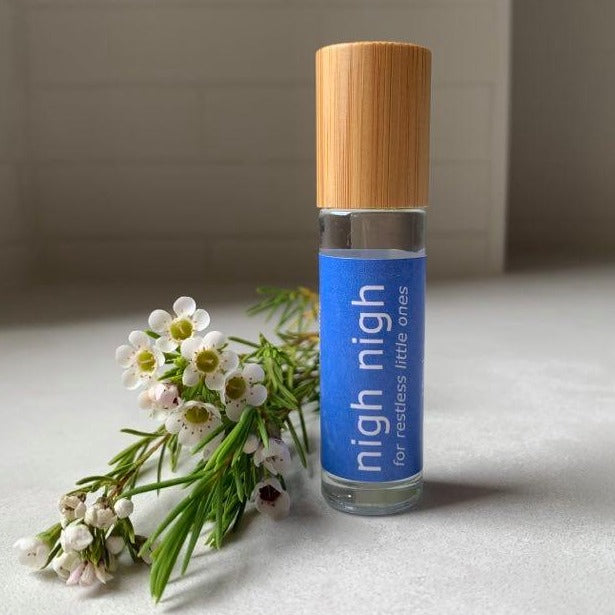 nigh nigh essential oil roller blend with Lavender, Roman Chamomile and Vetiver.